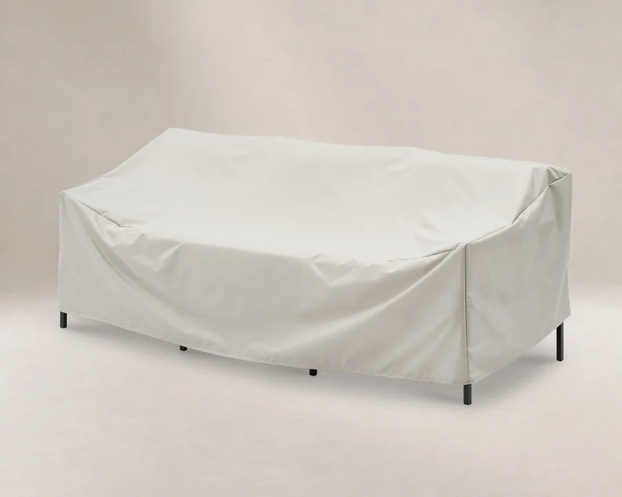 Ivory Castlery Sorrento cover fitted over a three-seater outdoor sofa.